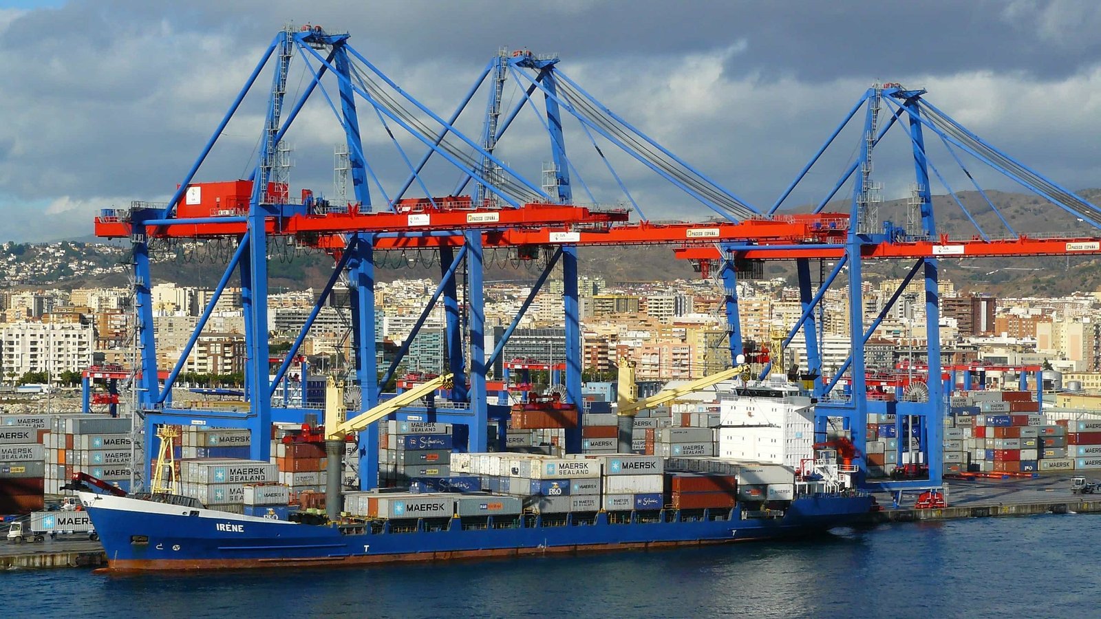 Container ship being loaded at port